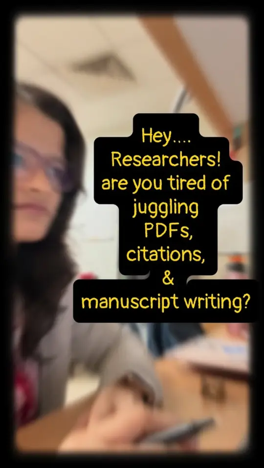 A researcher writing at a desk, with an on-screen caption asking "Researchers! are you tired of juggling PDFs, citations, & manuscript writing?"